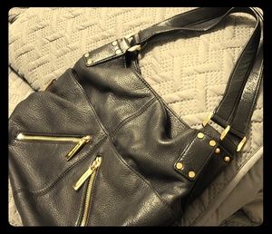 Gently used Michael Kors black leather bag
